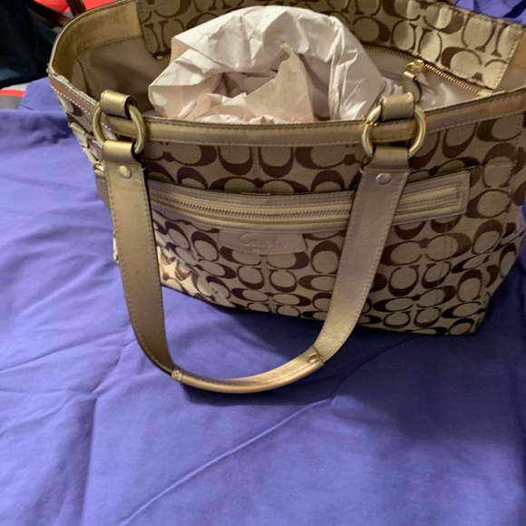 Gold and Tan with brown C’s on it . - Picture 2 of 2